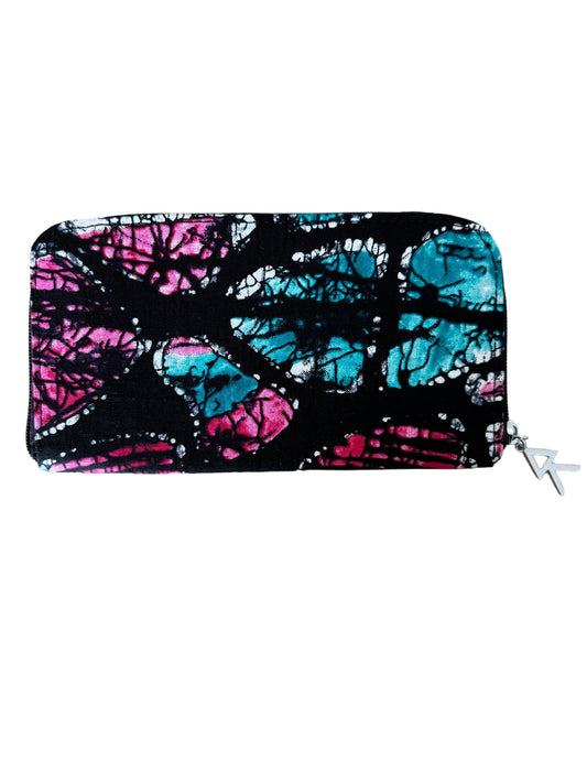 Mowo wallet, with zipper and african print details on the inside of the wallet.