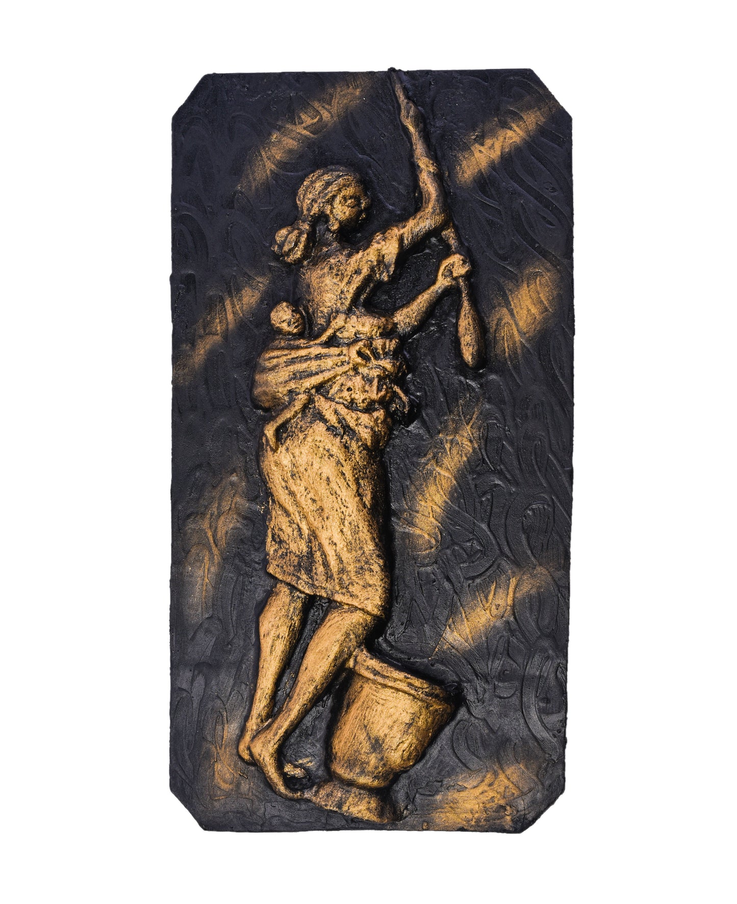 Mother pounding with her baby on her back