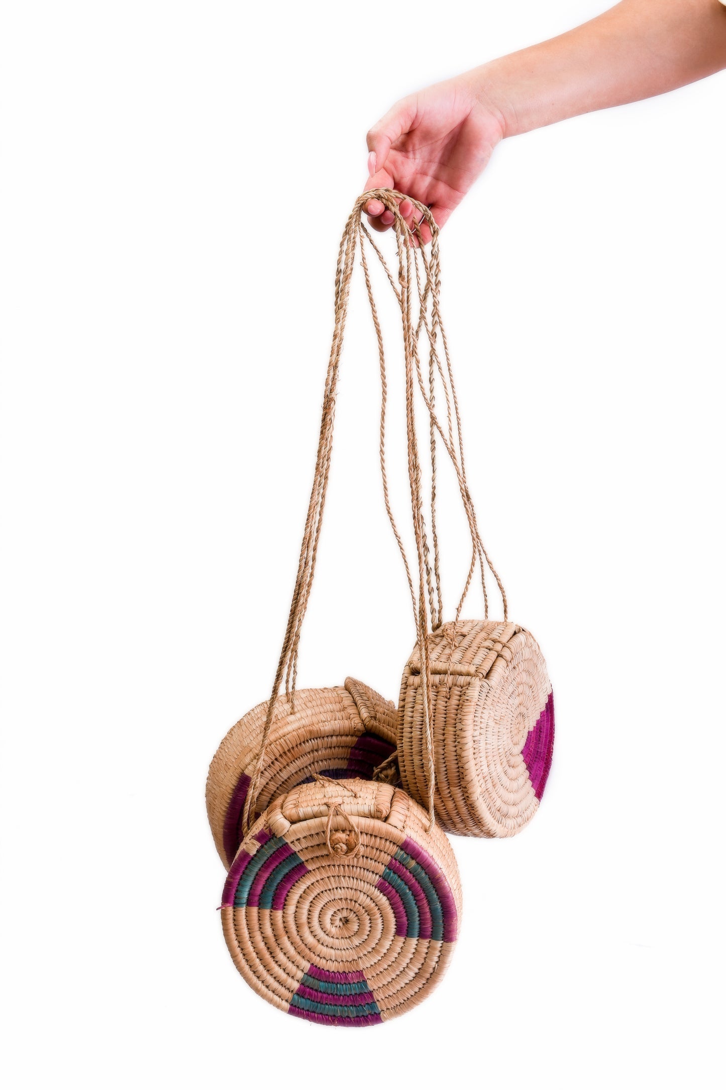 Dahomey: Purple rattan round bags